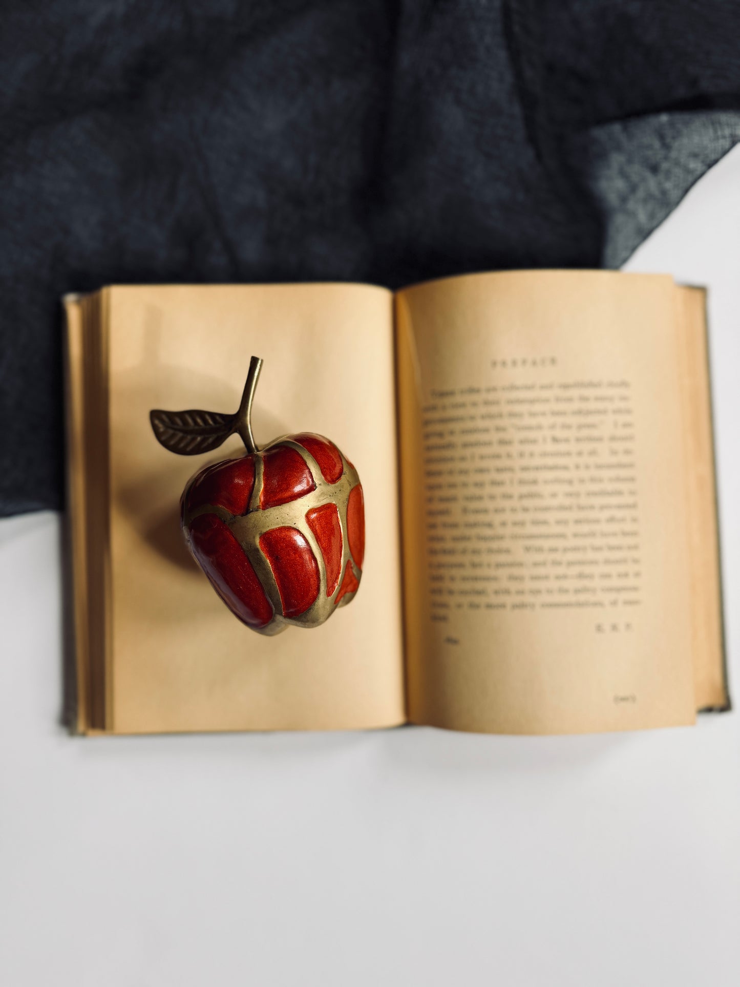 Brass and red enamel apple