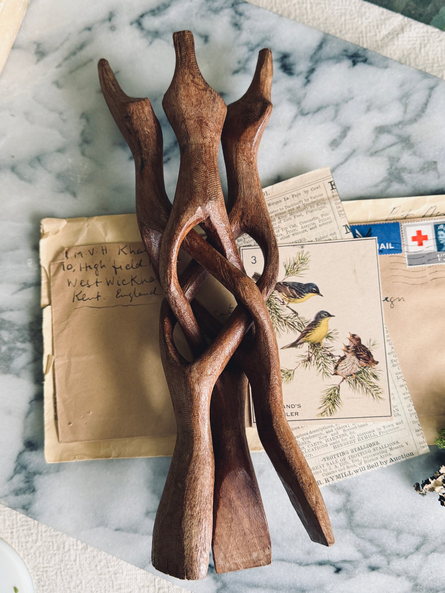Large hand carved tripod