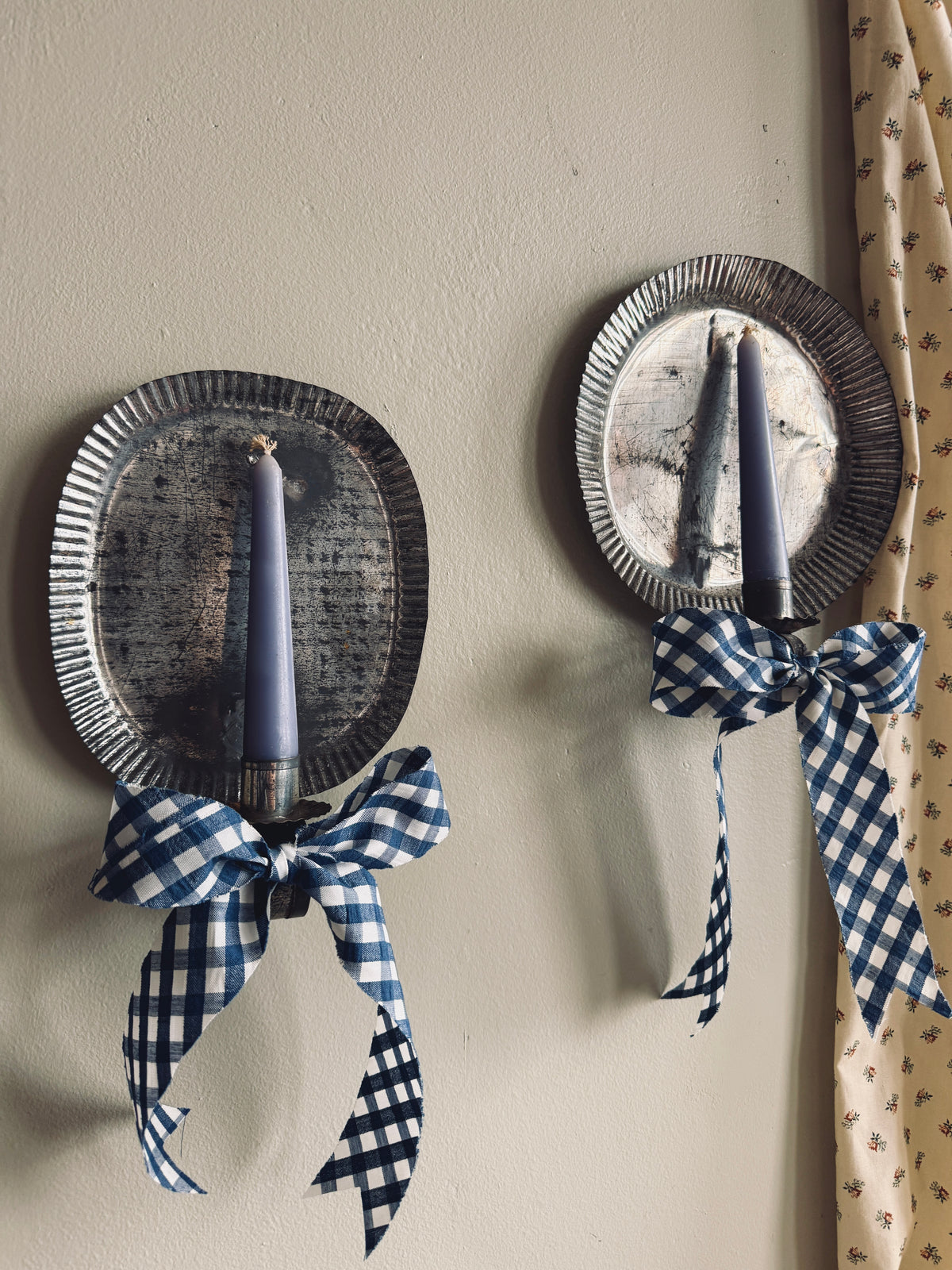 Tin candle sconces