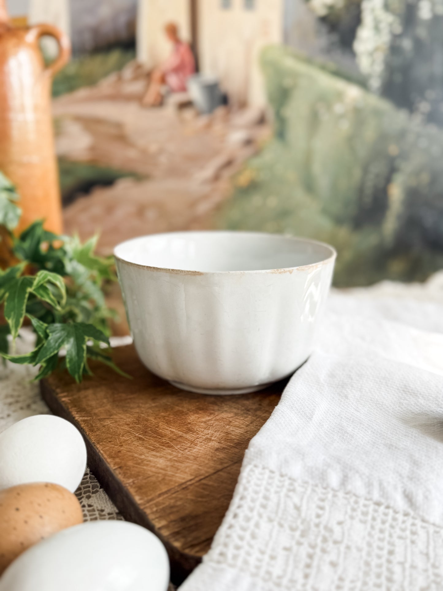 Small stained and crazed antique ironstone bowl