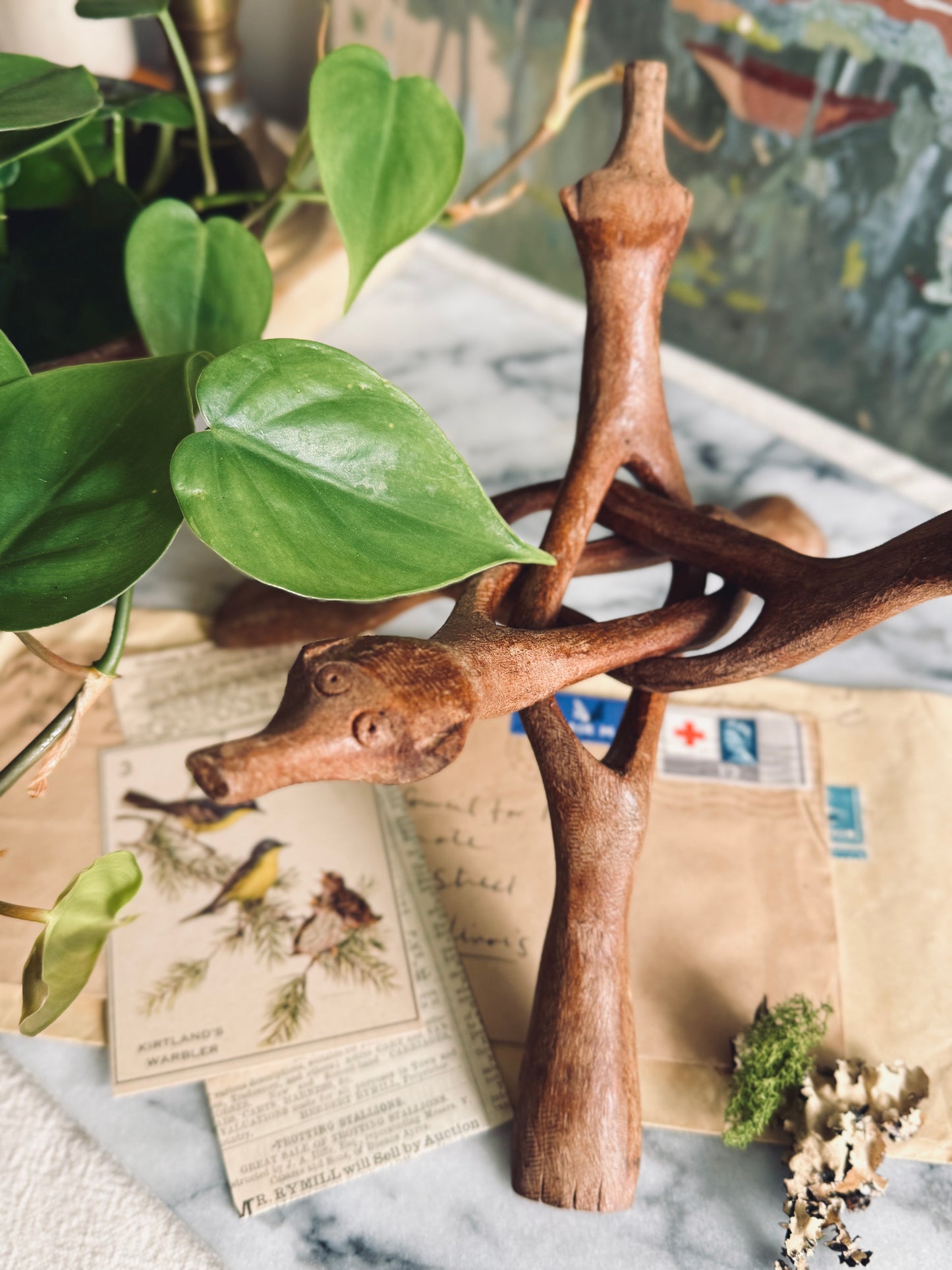 Large hand carved tripod