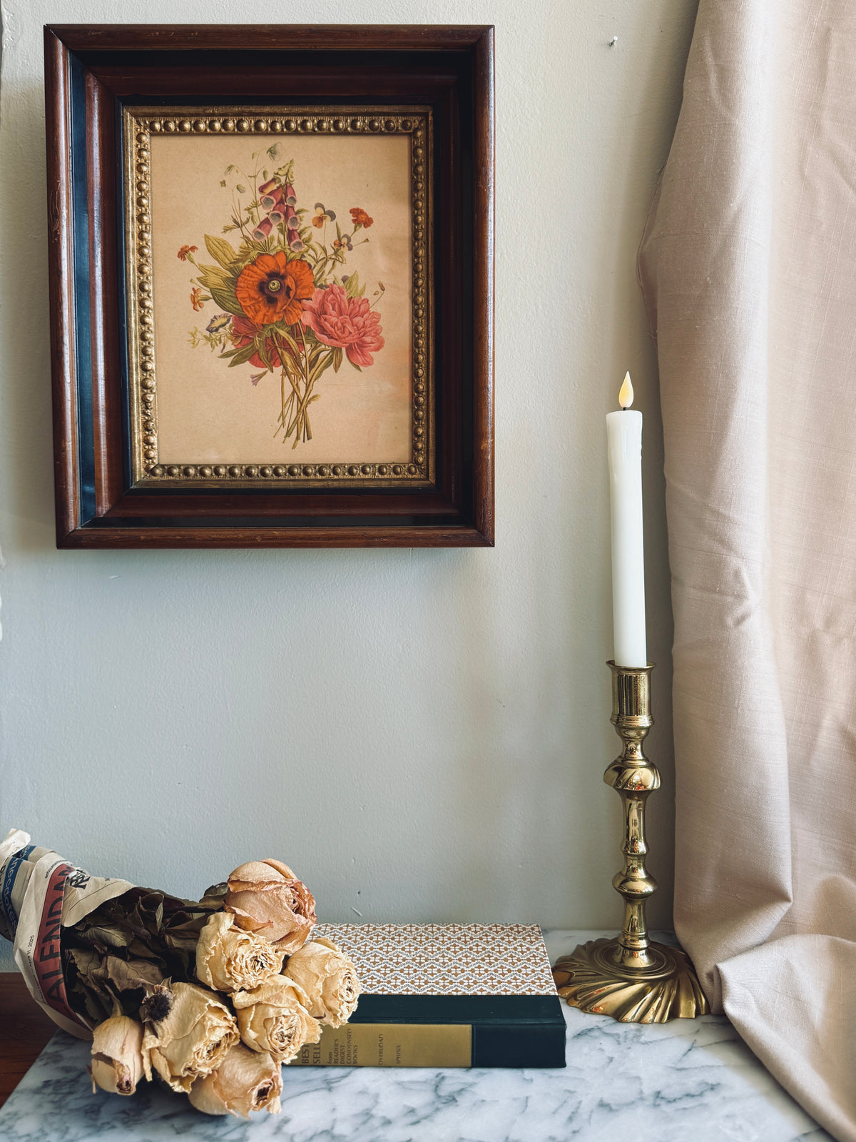 Floral print in deep set antique frame