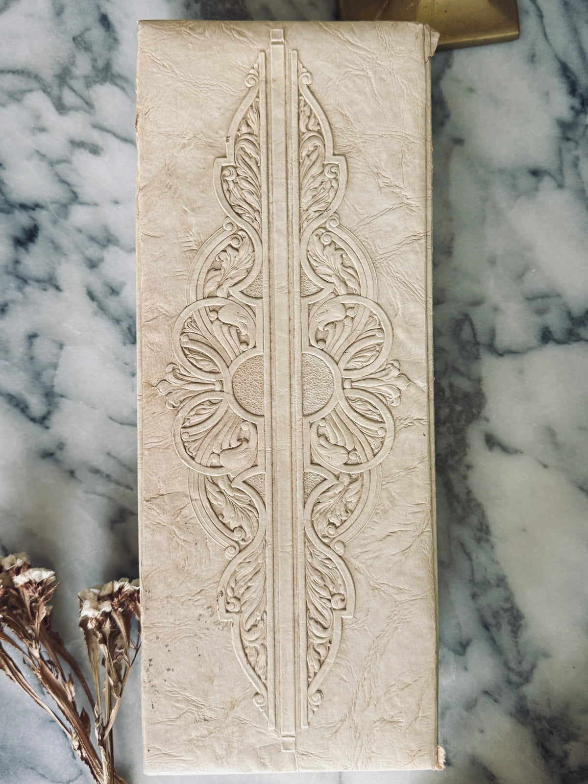 Embossed glove box