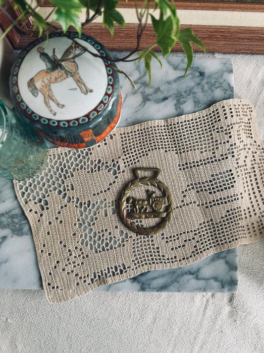Brass horse buckle wagon in wreath