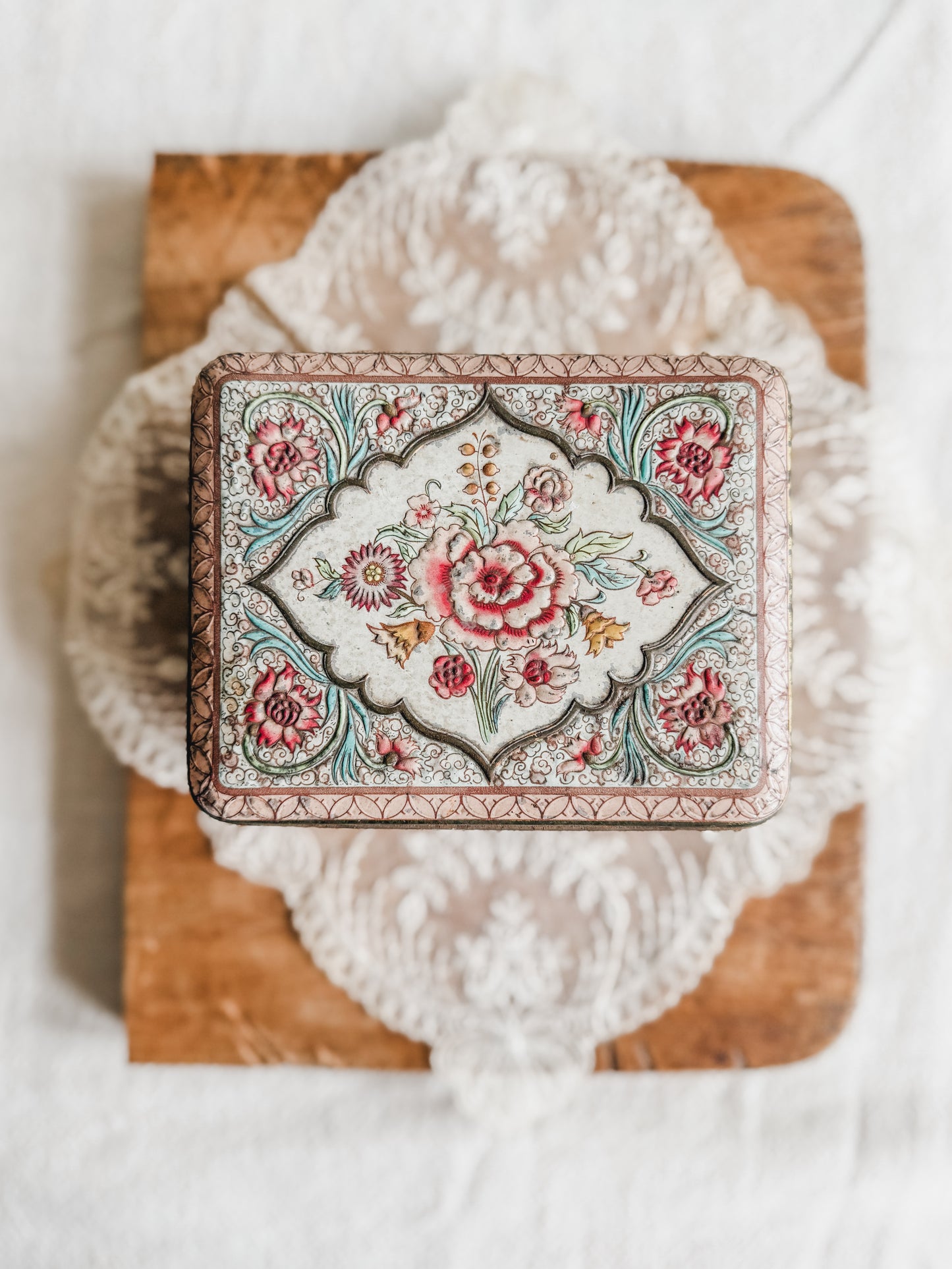 Small floral tin