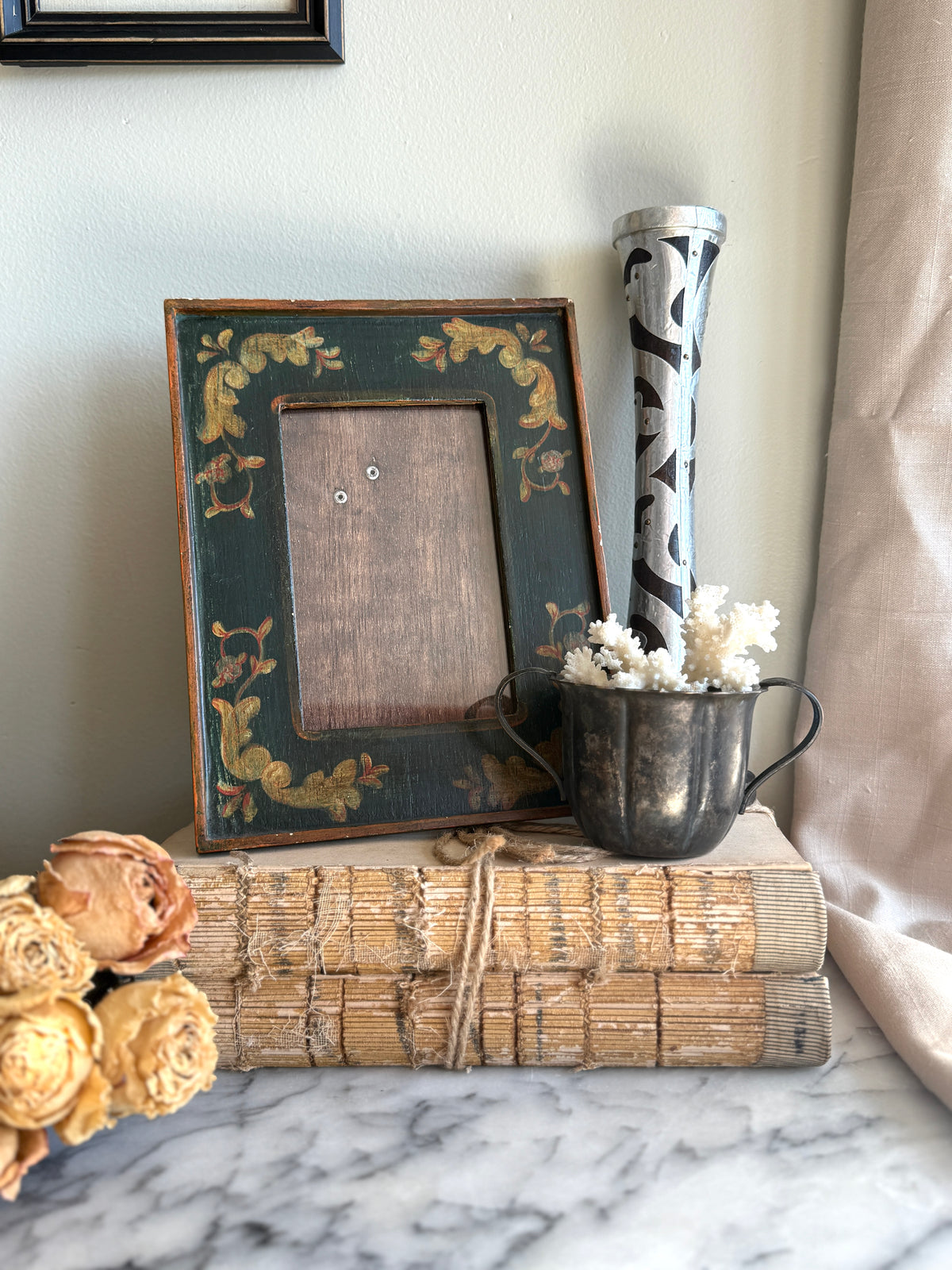 Handmade wooden frame with painted details