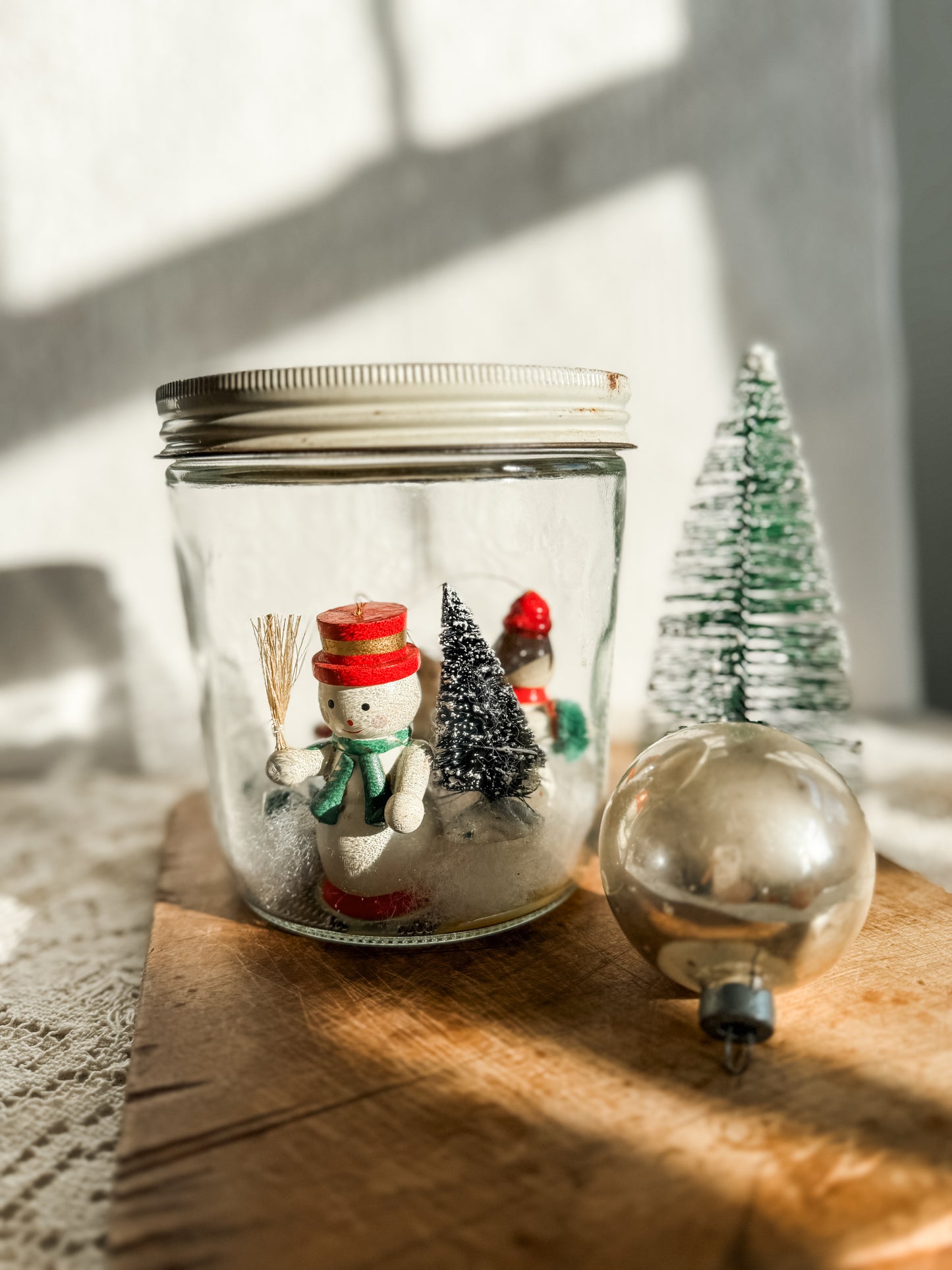 Vintage jar with handmade snowy scene