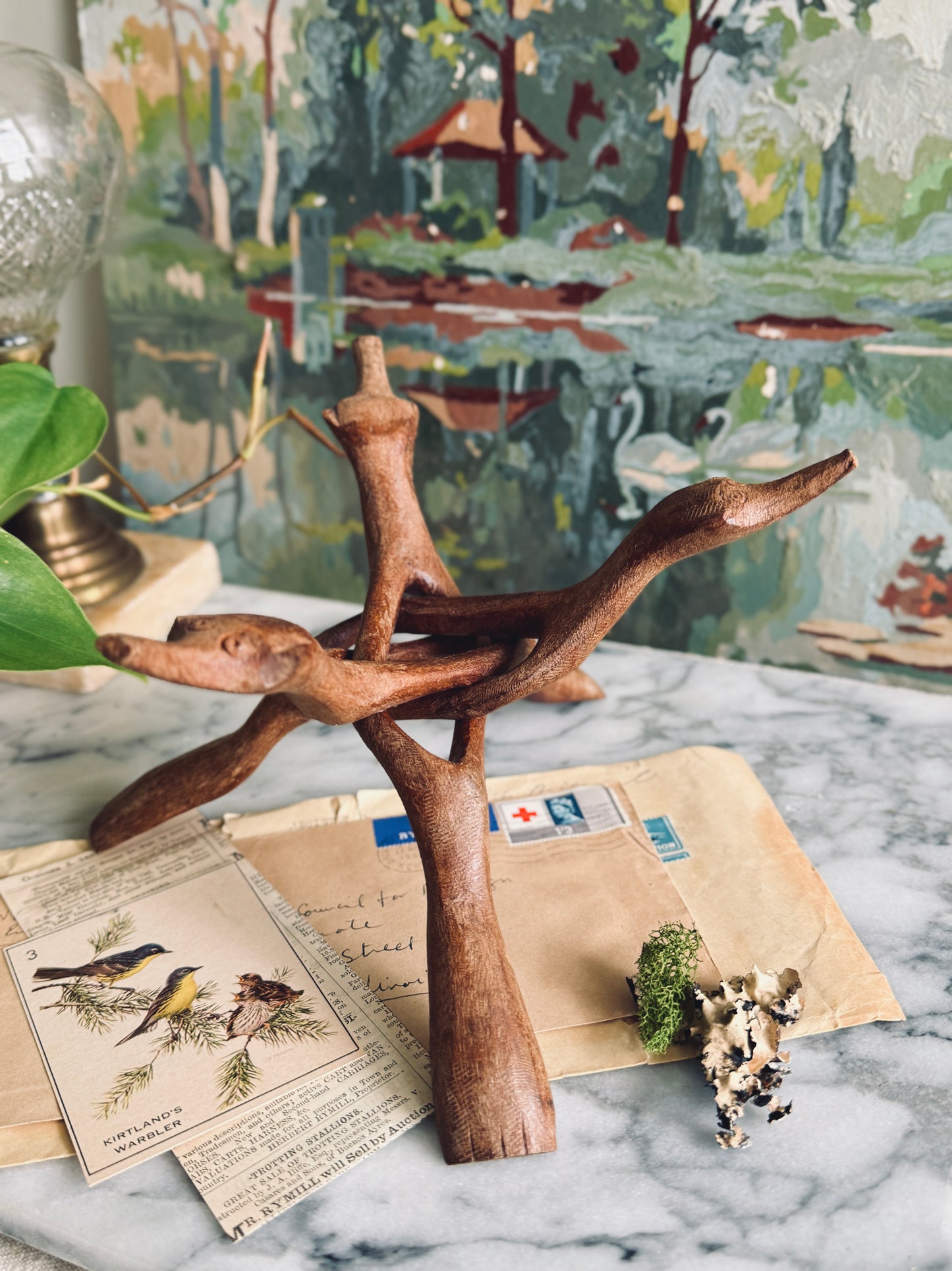 Large hand carved tripod