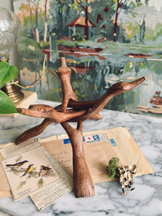 Large hand carved tripod