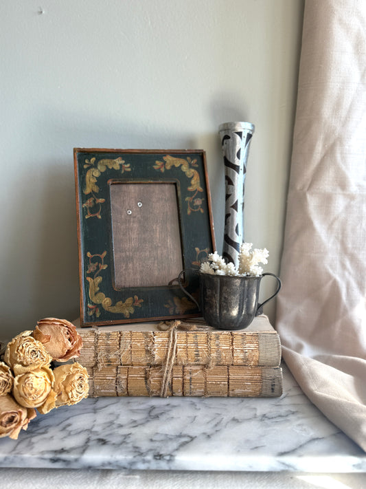 Handmade wooden frame with painted details