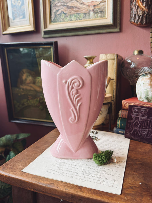 Pink tulip shaped pottery vase with fern frond detail