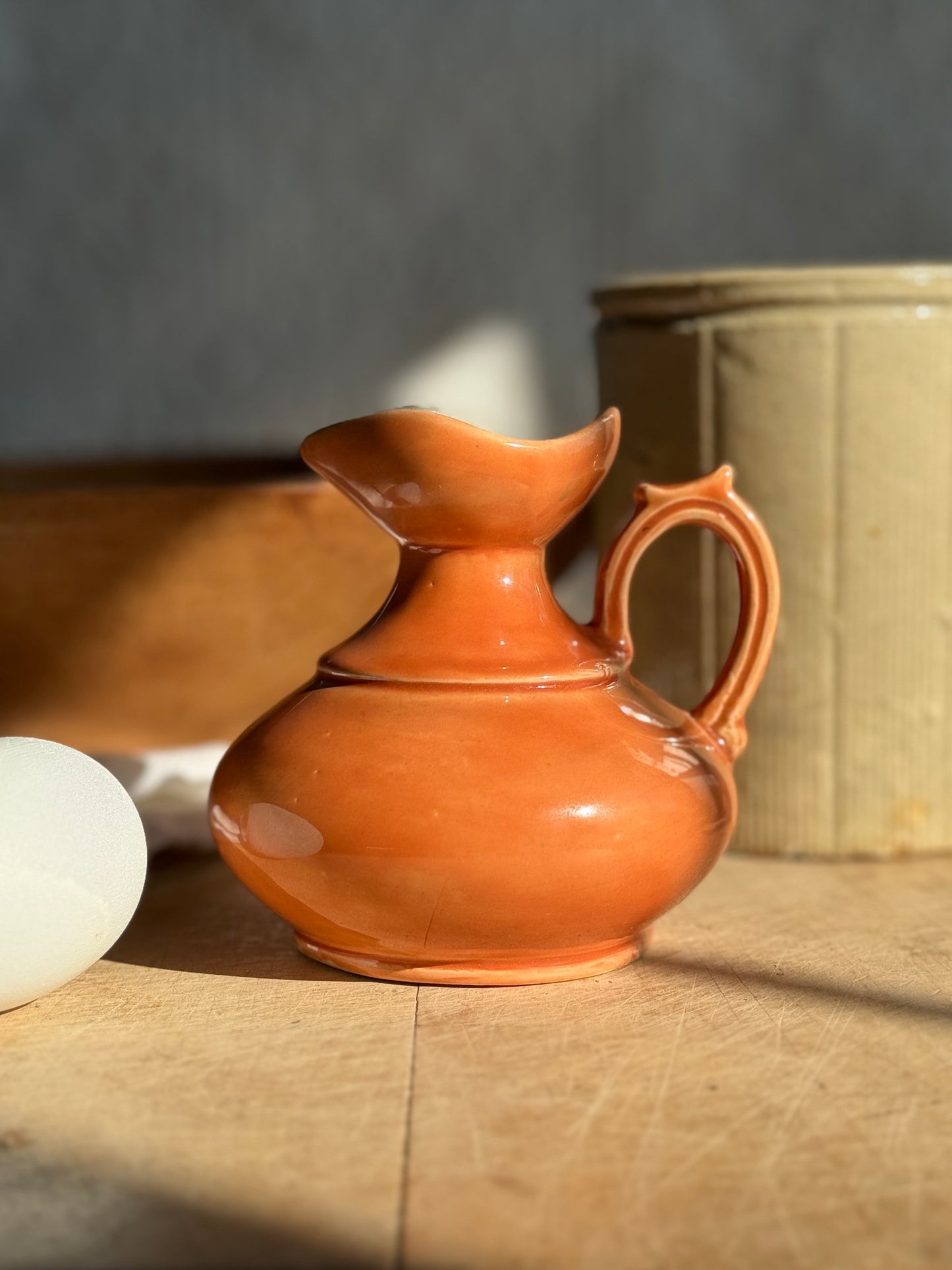 Small orange Italian pitcher
