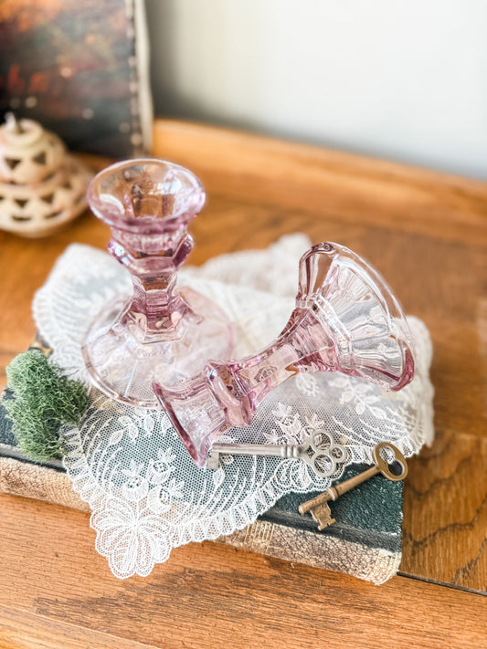 Vintage glass candlesticks in a soft lilac color