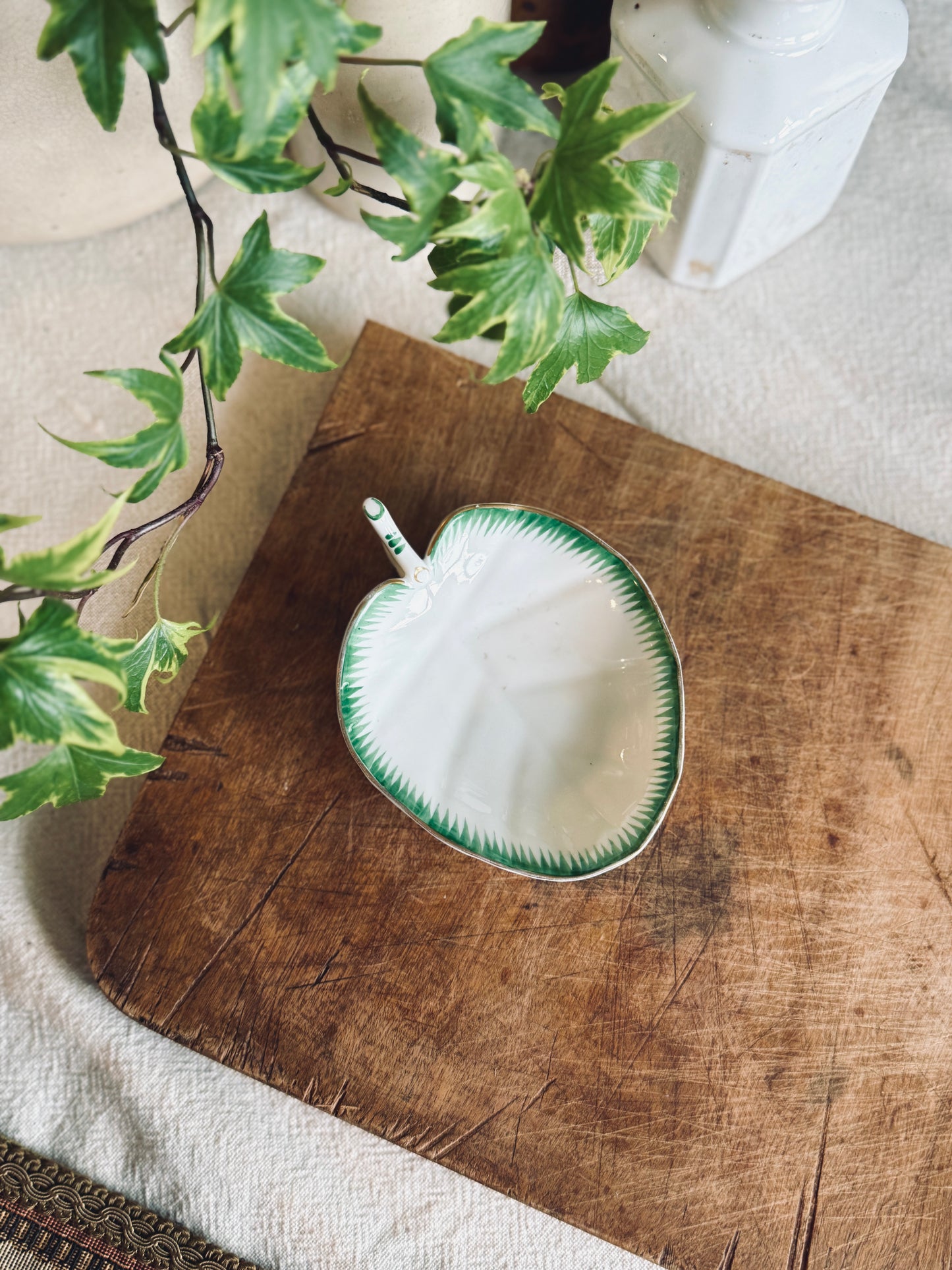 Small rare porcelain leaf dish with handle