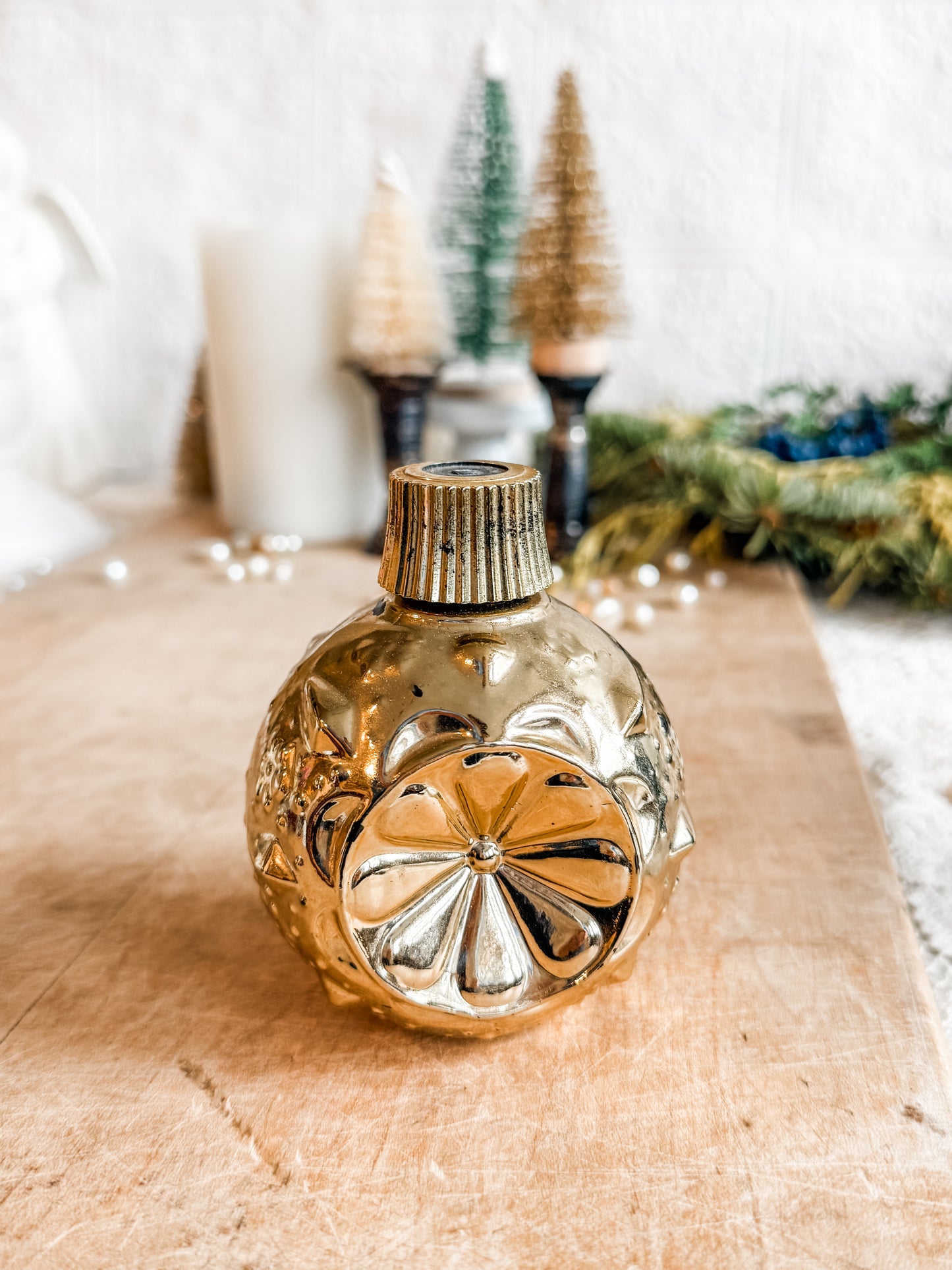 Gold Avon ornament decanter