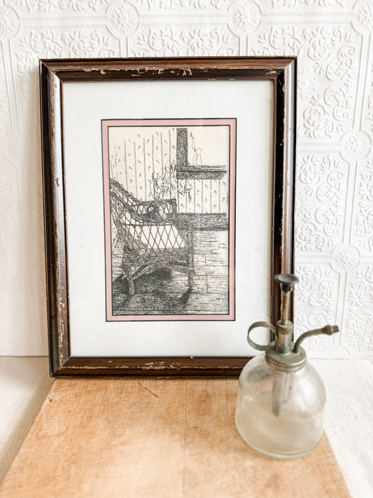 Framed original ink drawing of a wicker chair, signed by the artist