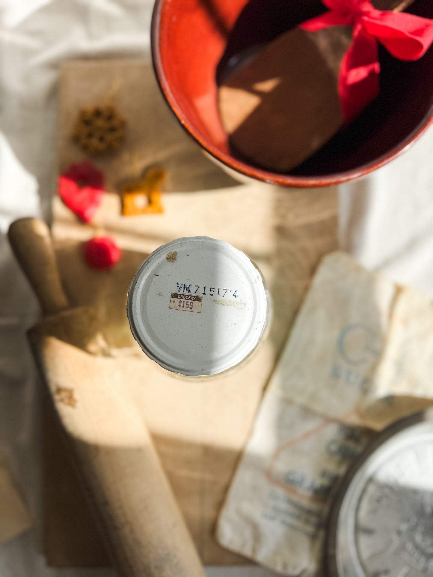 Vintage glass lidded jar with green ornaments