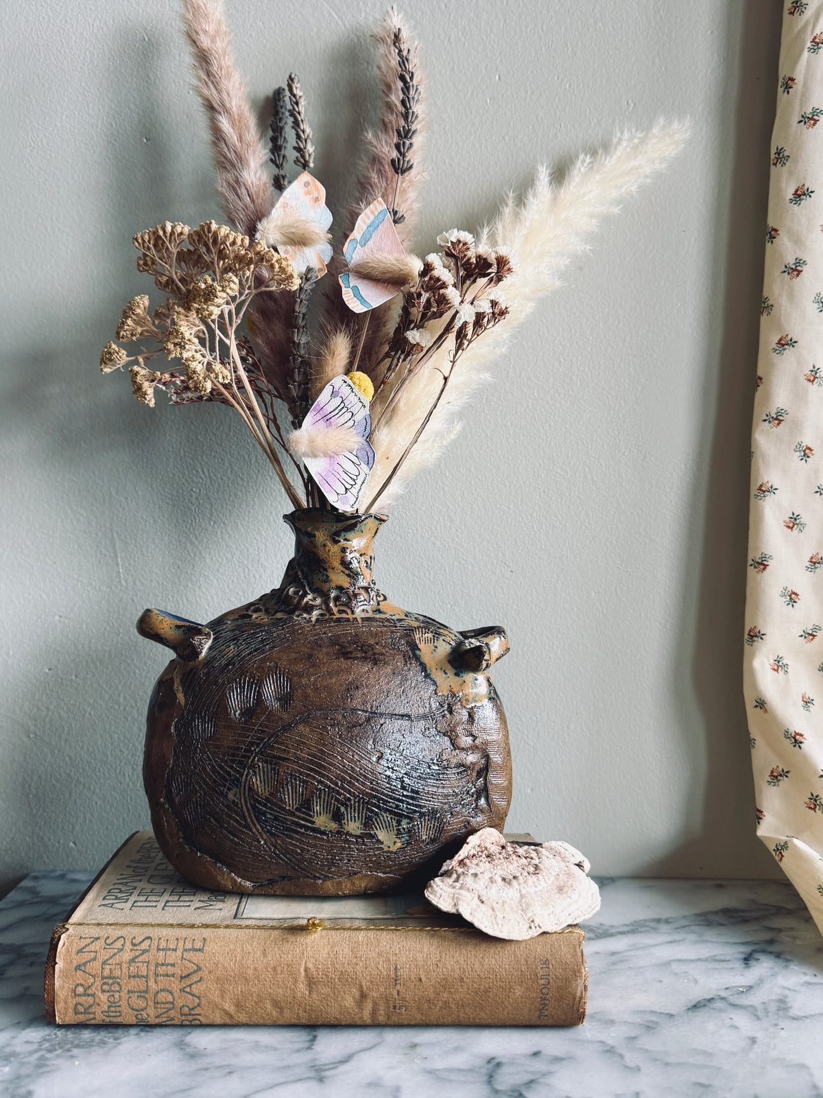 Studio pottery vase with handles