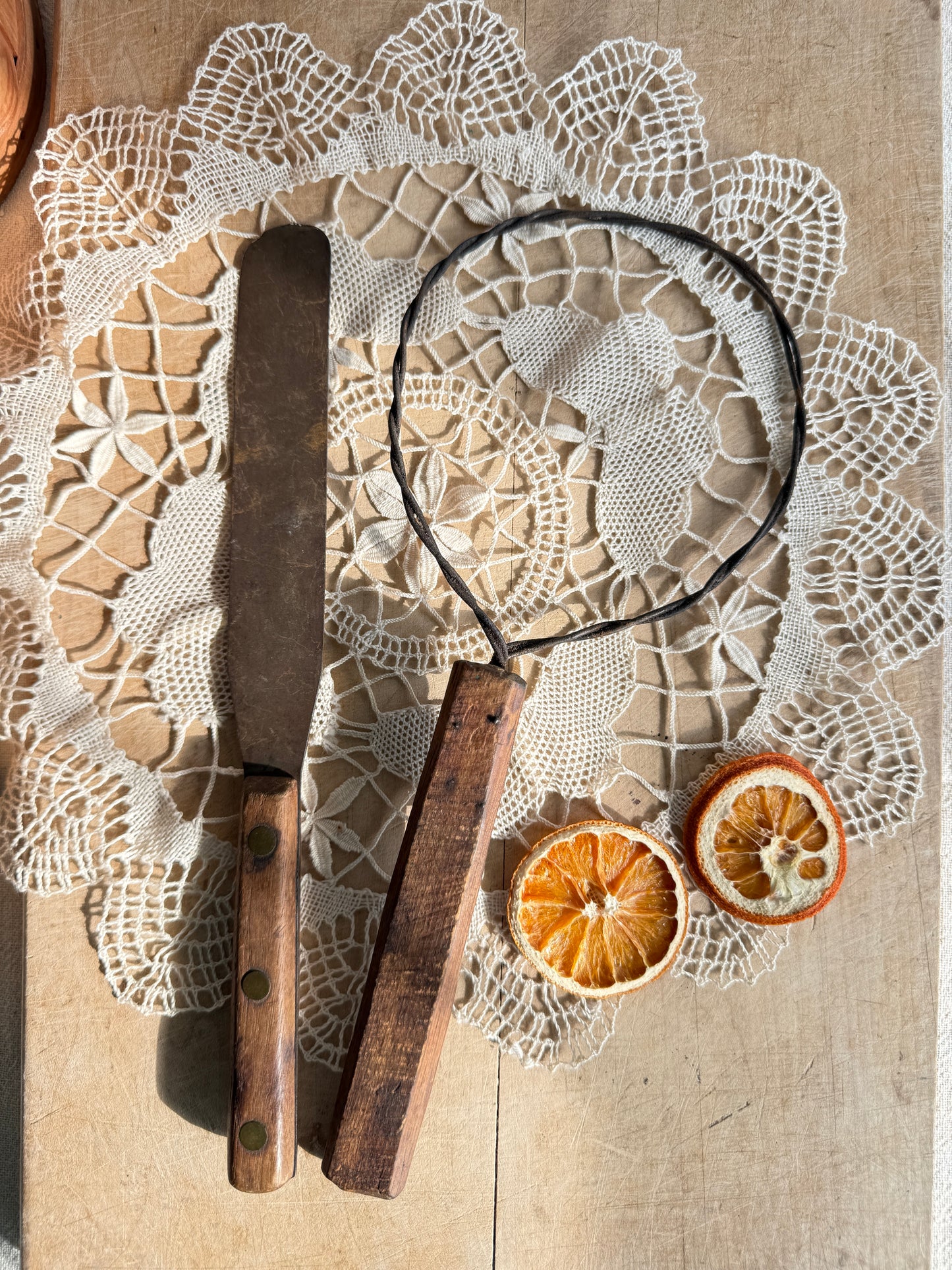 Two primitive style vintage kitchen tools