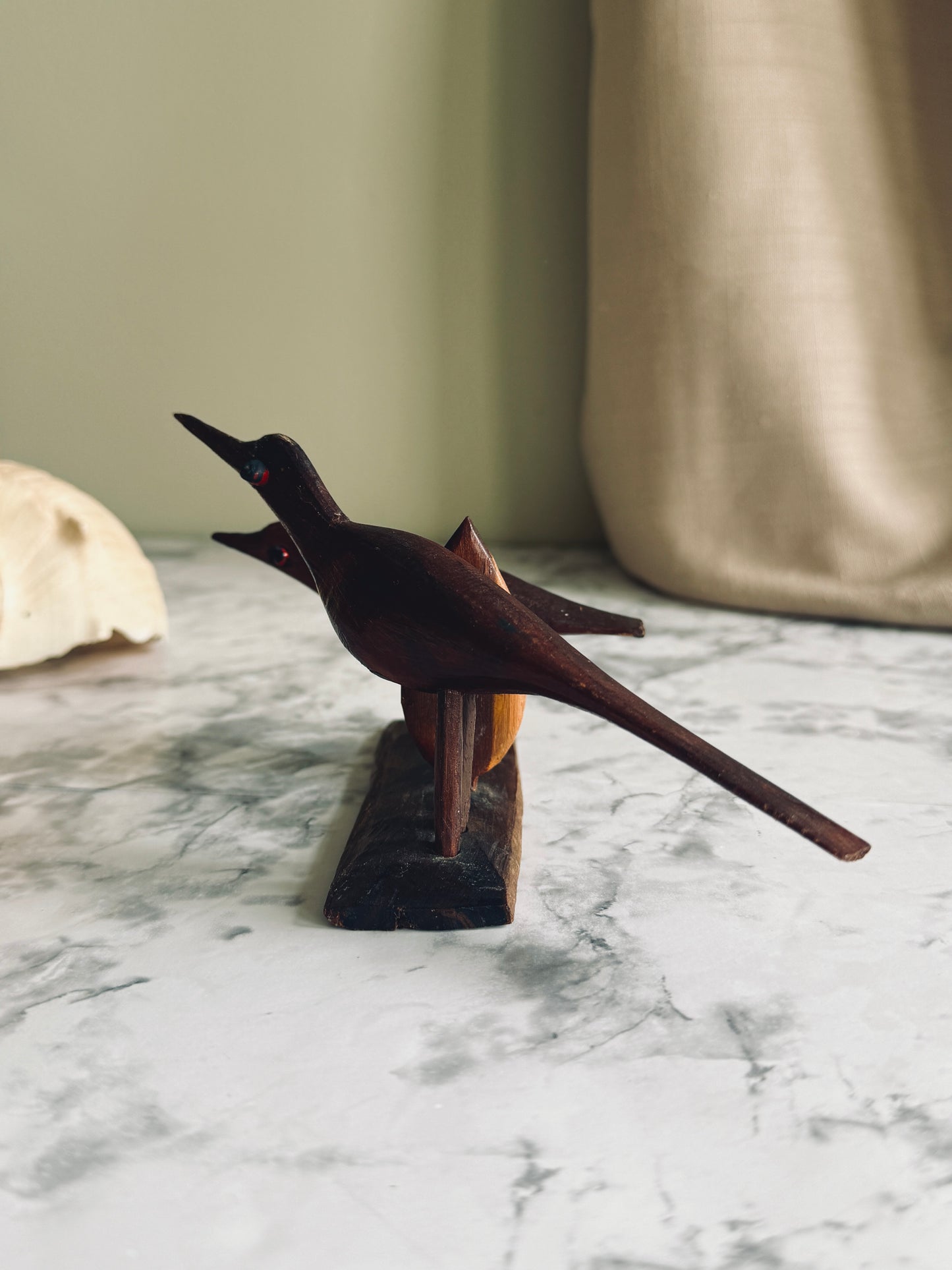 Handcarved wooden birds