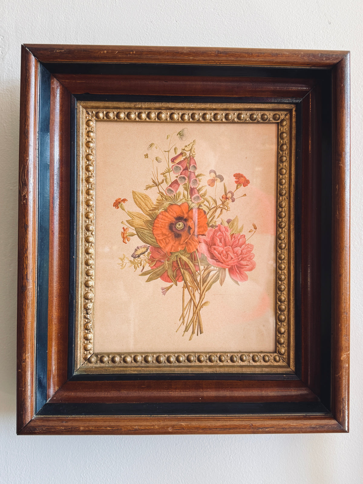 Floral print in deep set antique frame