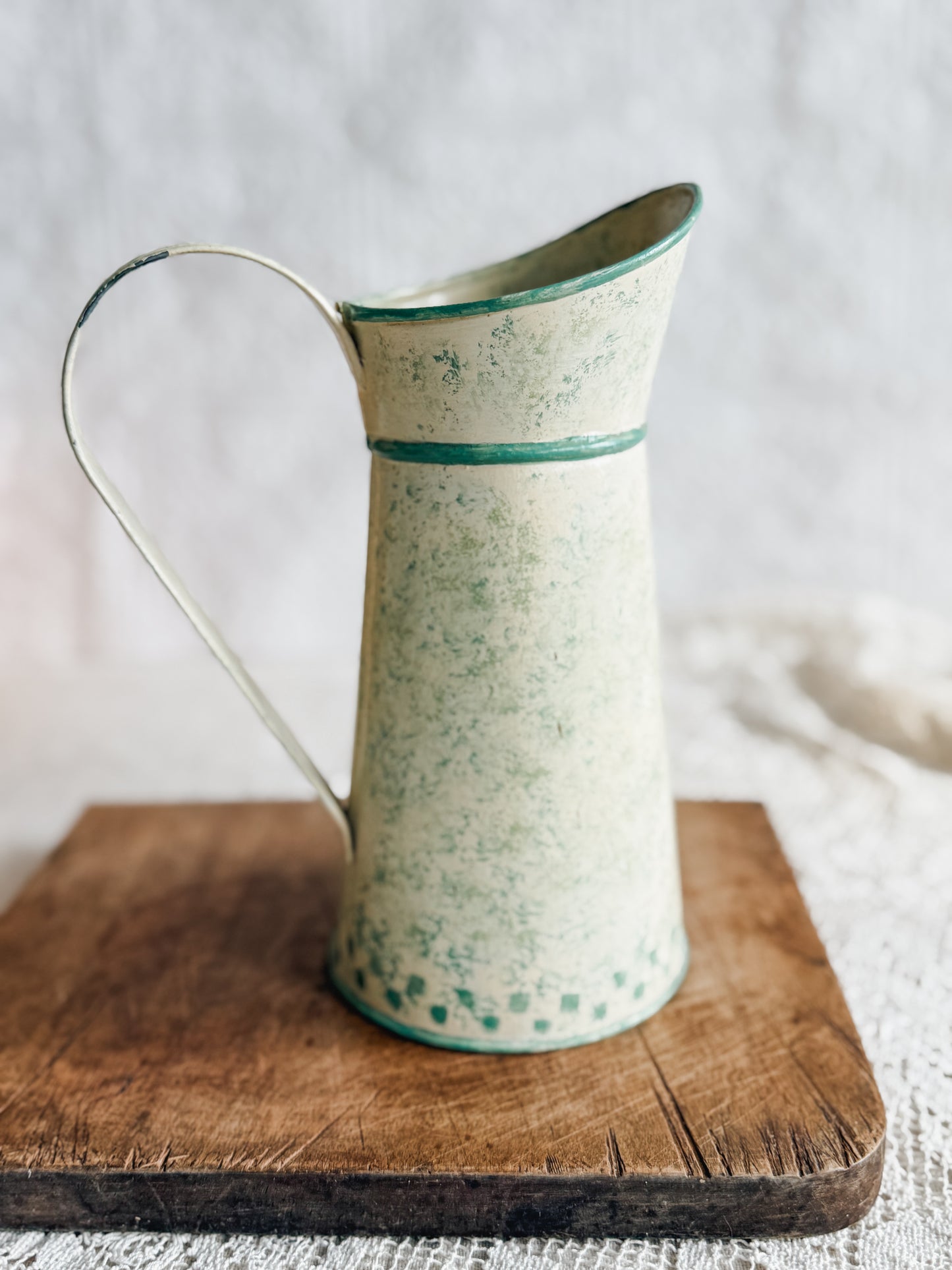Handpainted green and yellow pitcher