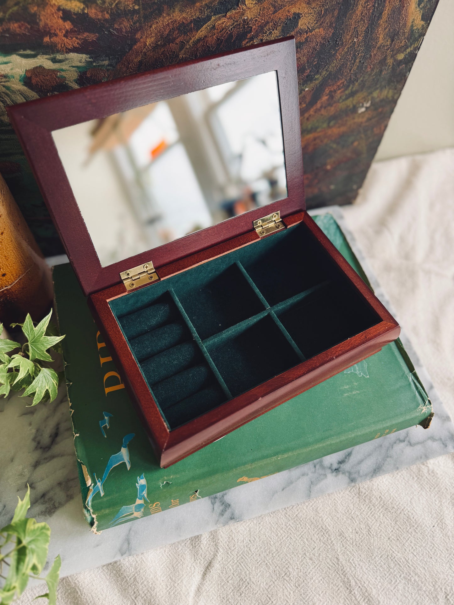 Wooden jewelry box with floral fabric inlay on lid