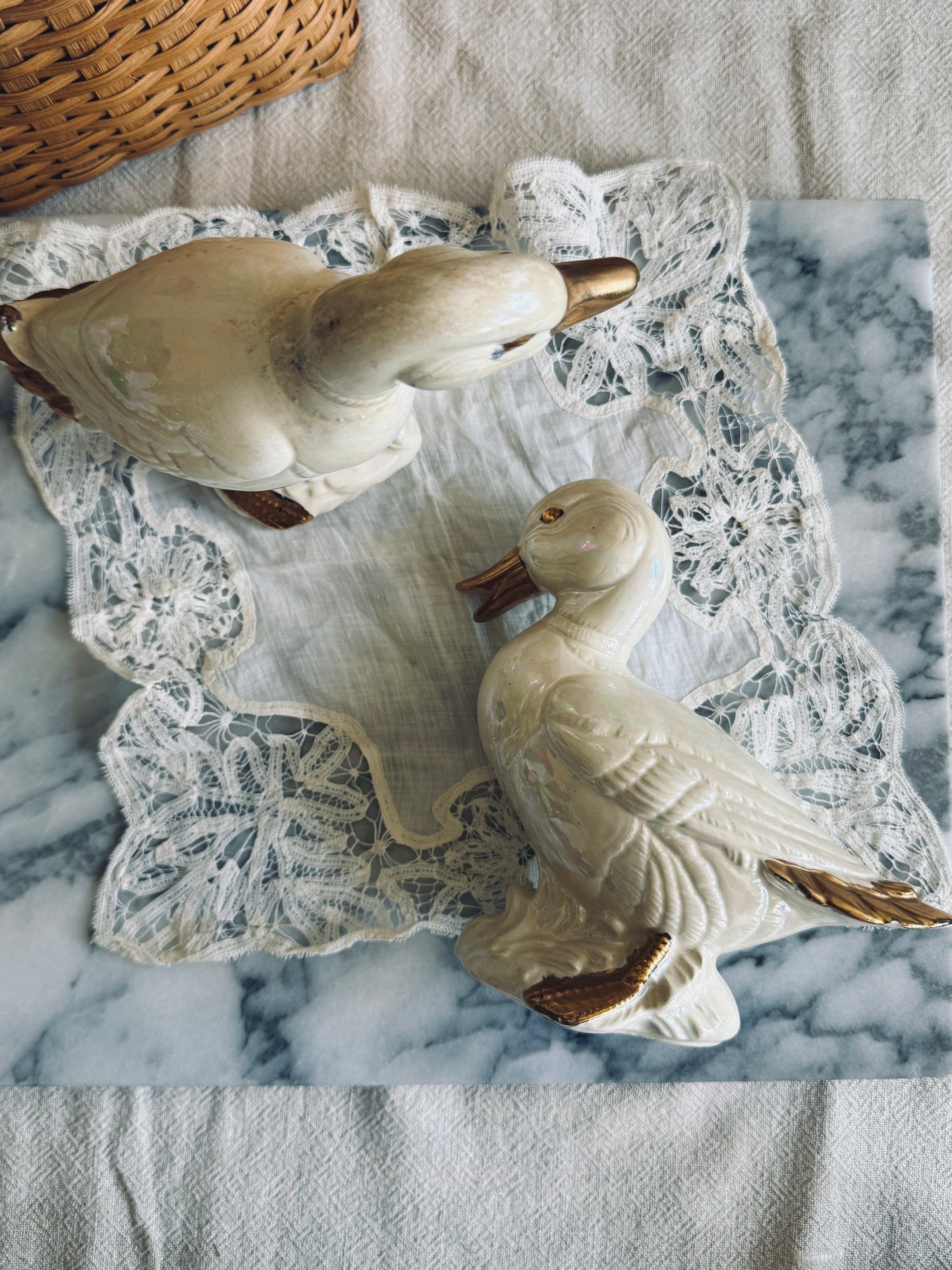 Pair of white and gold porcelain ducks