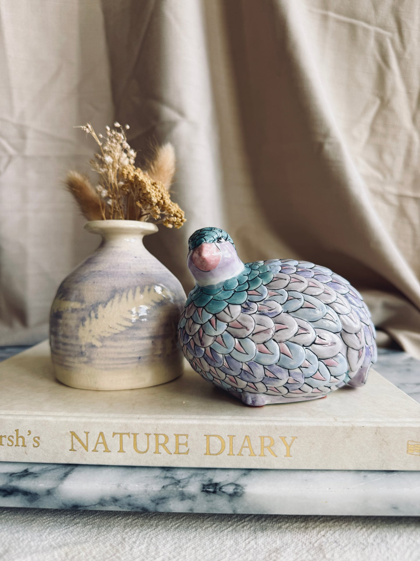 Colorful ceramic quail