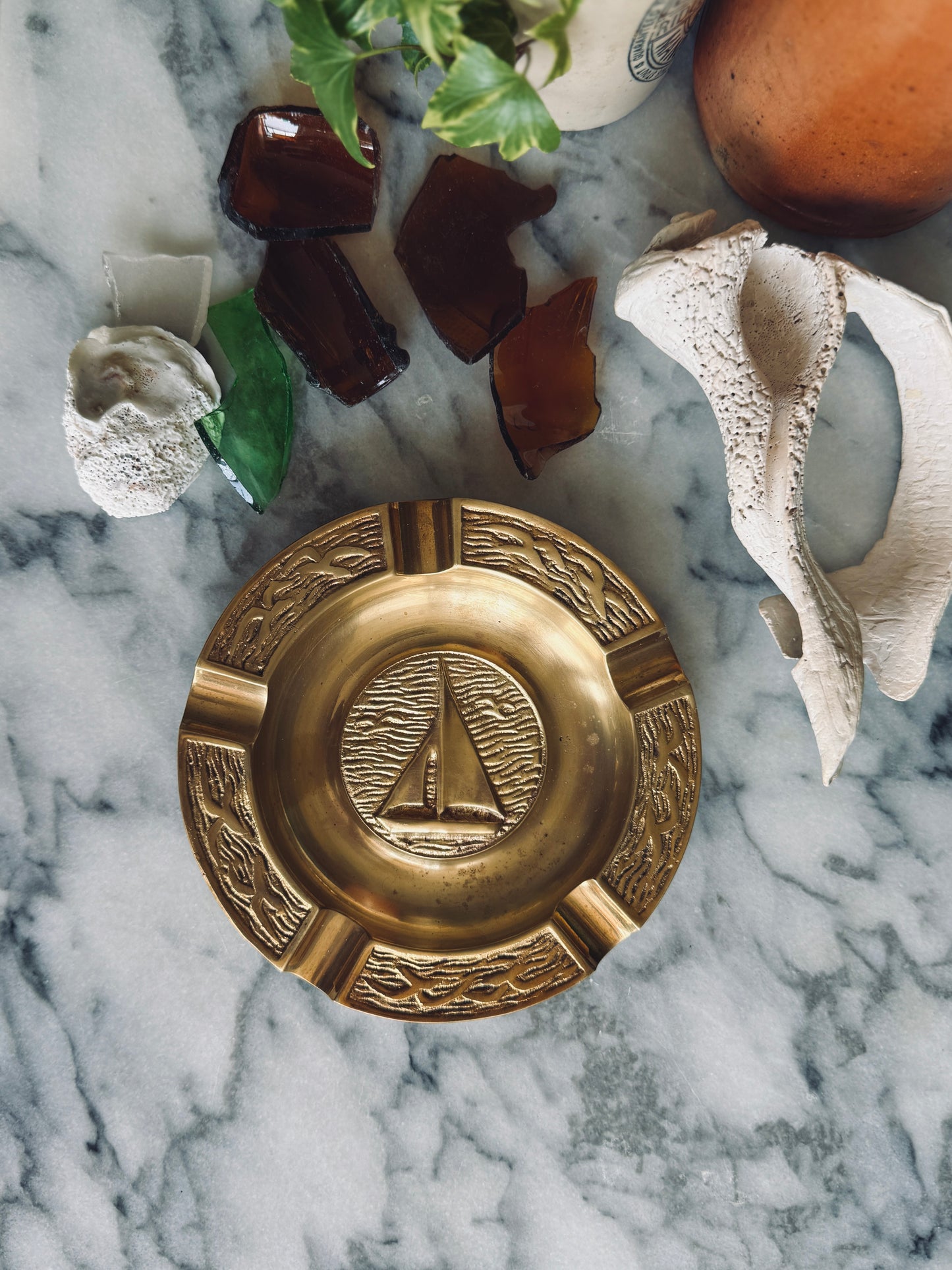 Brass ashtray with sailboat and seagulls