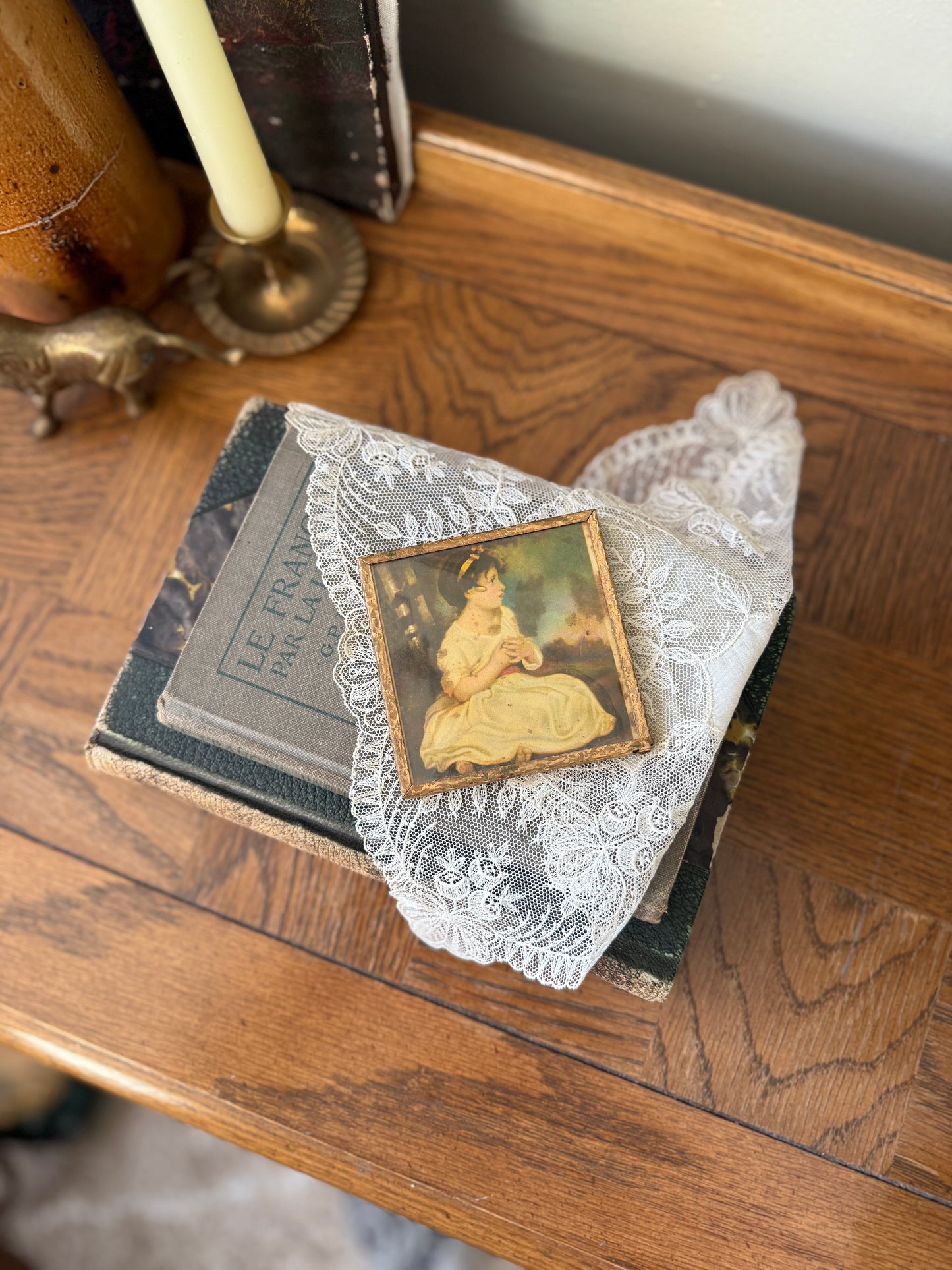 Small framed art of young girl