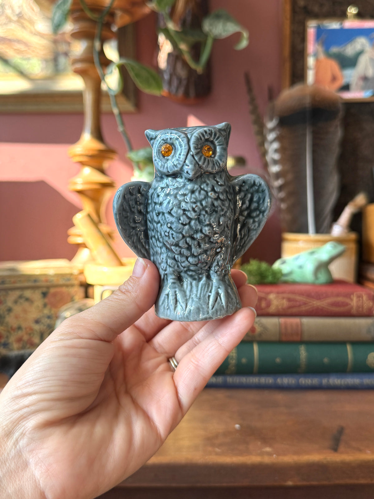 Grey ceramic owl with orange gem eyes